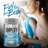 AMPLIFY envase junto a elementos cotidianos para comparar tamaño y porciones fácilmente