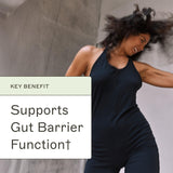 Amy Myers MD cucharada de producto junto a vaso para medir porción