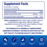 Anabolic Laboratories producto en mesa con frutas y elementos de bienestar