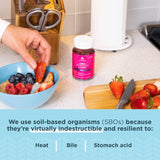 Ancient Nutrition frasco junto a regla para visualizar tamaño y cantidad 60 unidades