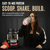 Animal Whey isolate cuchara medidora con polvo indicando 25 g proteína por servicio