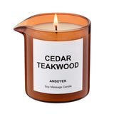ANSOYER vela aceite de masaje cedro teakwood vista frontal con etiqueta clara y tamaño 8 oz
