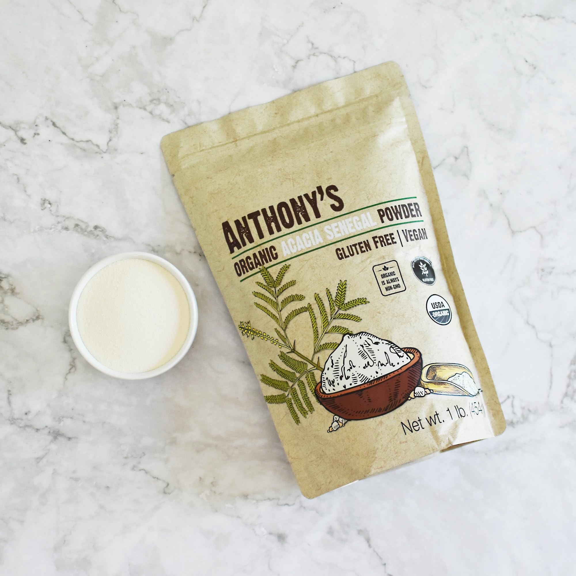 Anthony's Acacia Senegal en una encimera junto a recetas para añadir fibra en la cocina
