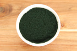 Anthony's spirulina en cuchara para comparar porción, control de dosificación