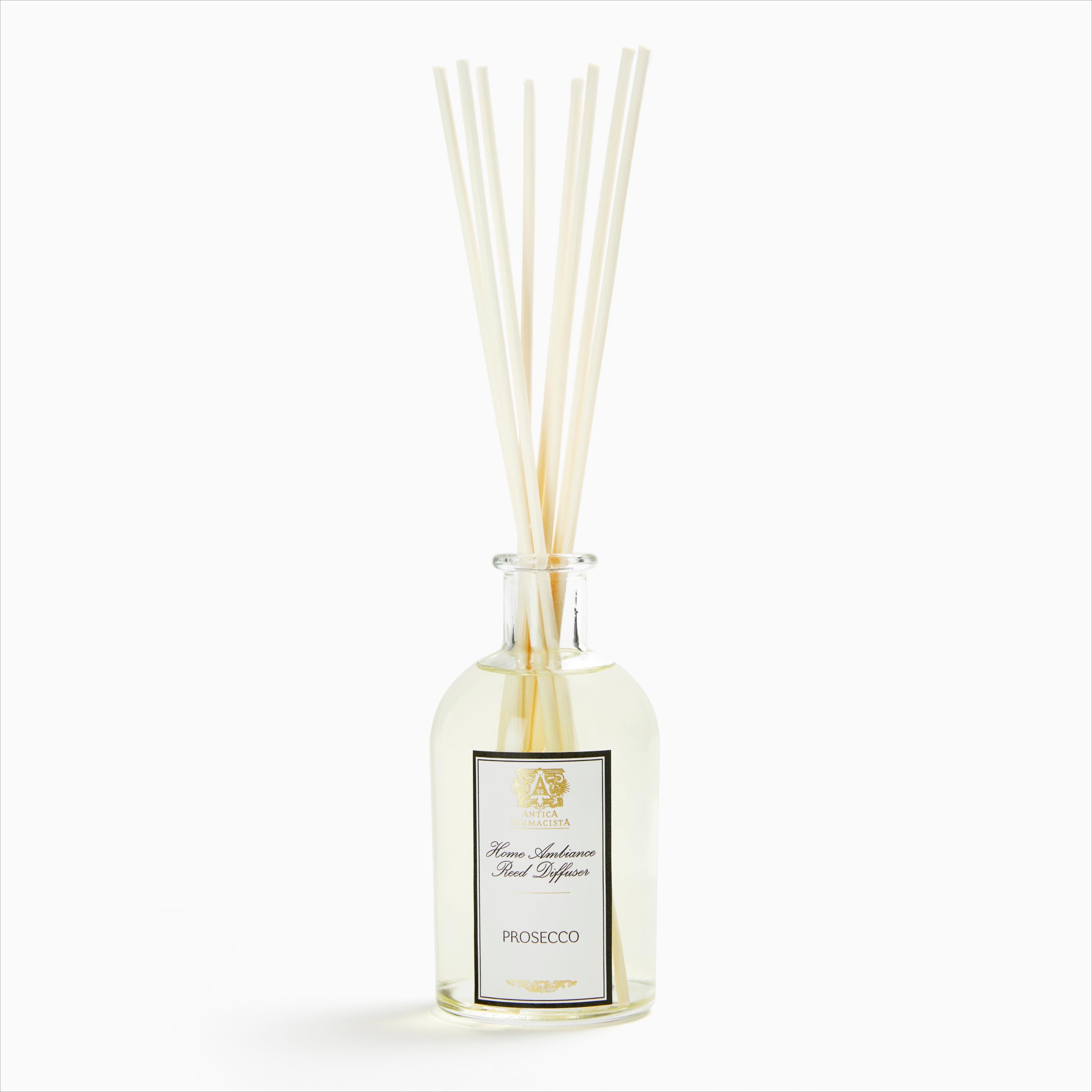Antica Farmacista difusor Prosecco vista frontal y vidrio elegante, aporta estilo