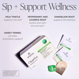 Arbonne Cleantox taza servida en mano, infusionando para un momento calmado y sin cafeína