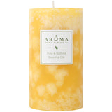 Aroma Naturals vela pilar frontal mostrando color amarillo reconfortante