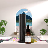 AromaTech gota del aceite en fondo claro para ver textura y pureza