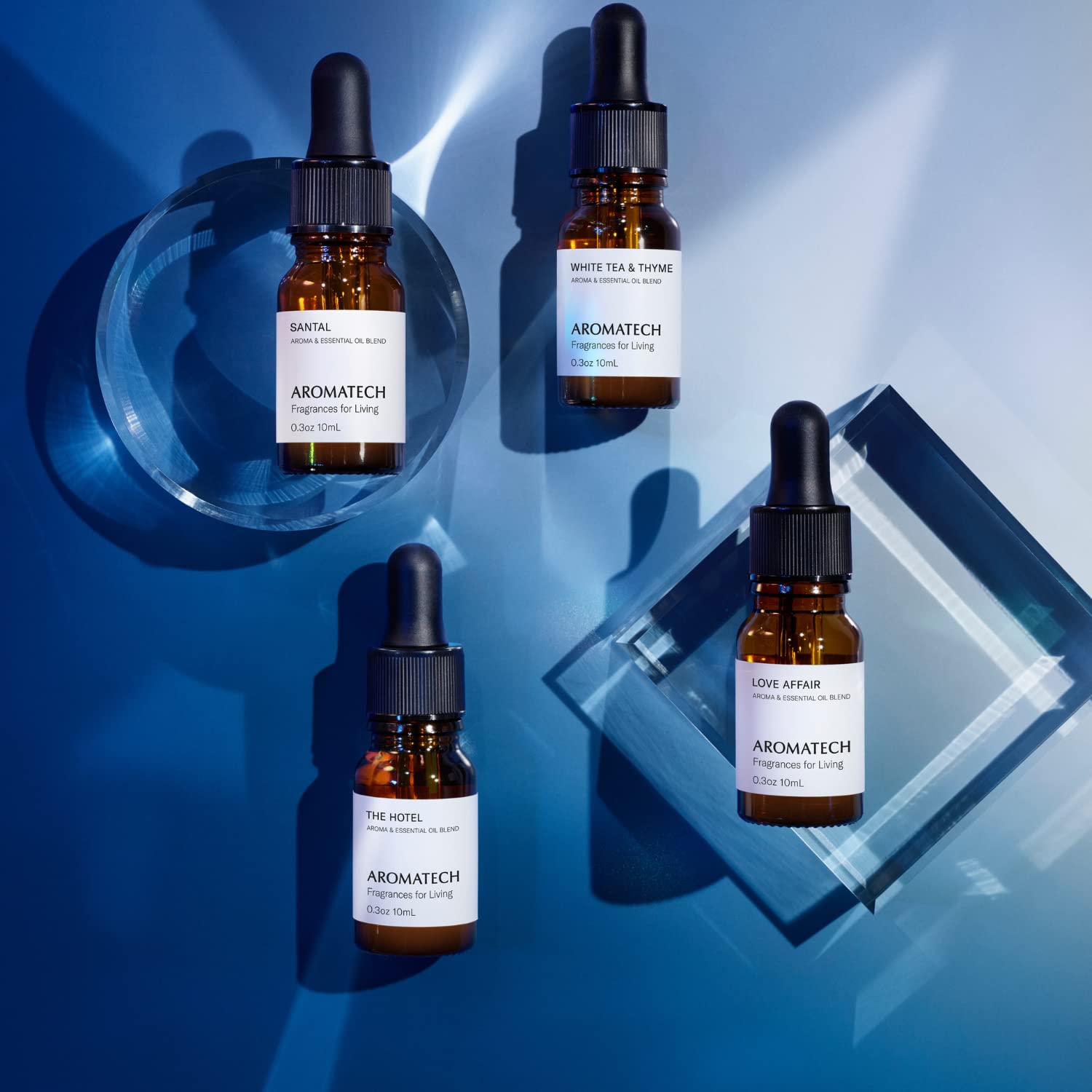 AromaTech primer plano del frasco Santal mostrando textura y etiqueta clara