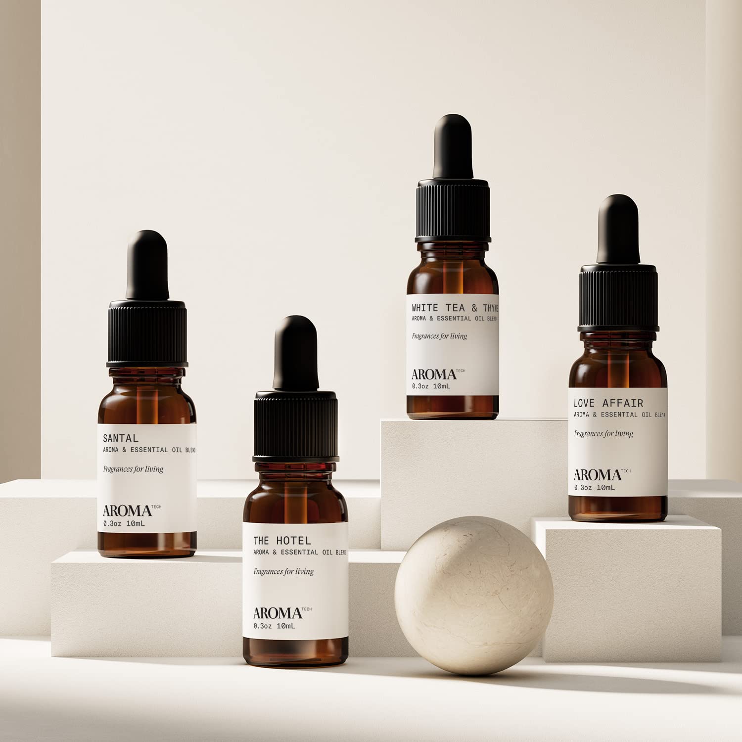 AromaTech gotas de The Hotel sobre superficie, destacando aroma cítrico renovador