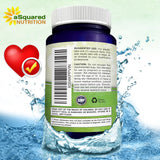 aSquared Nutrition cápsula junto a una regla para comparar tamaño
