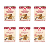 Atkins barrita frontal paquete visible, sabor blueberry y beneficios proteicos