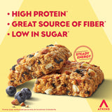 Atkins barrita en mano como snack portátil y saciante