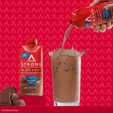 Atkins batido en mano de usuario ideal para consumo postentrenamiento