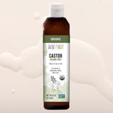 Aura Cacia envase en escena estilo spa transmitiendo calma