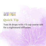 Aura Cacia comparación de tamaño 118 ml junto a objetos cotidianos