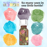 Aura Cacia botella 60 ml junto a objeto para escala visual