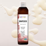 Aura Cacia envase en baño con plantas transmite uso natural y bienestar