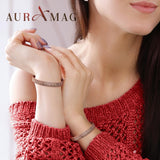 Auramag detalle del diseño flor de ciruelo que aporta elegancia
