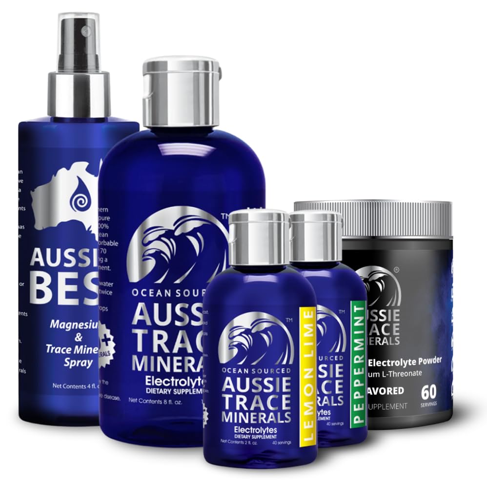 Aussie Trace Minerals junto a mano para comparar tamaño del envase de 60 ml