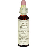 Persona usando Bach Cherry Plum gotas bajo la lengua para recuperar calma y claridad
