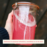 Ballerina Farm vaso preparado sabor frambuesa limón refrescante en mano