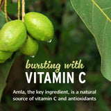 Banyan Botanicals amla fresca junto al frasco, destacando vitamina C natural