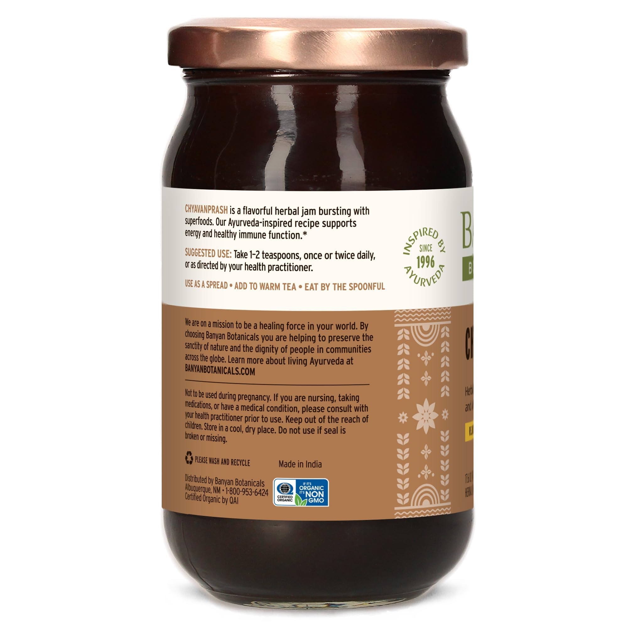 Banyan Botanicals frasco junto a moneda para comparar tamaño real del producto