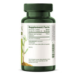 Banyan Botanicals tabletas junto a un vaso que sugiere formas de consumo