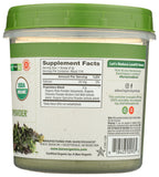 BareOrganics tarro de 8 oz junto a una mano para comparar tamaño