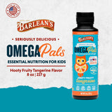 Barlean's cucharadita con porción de Omega Pals lista para administrar a niños