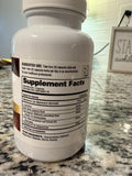 Barton Nutrition cápsula en mano para comparar tamaño y dosificación práctica