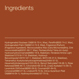 Bath & Body Works vela junto a mano para demostrar tamaño y proporción