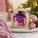 Bath & Body Works vela encendida en sala creando ambiente acogedor