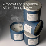 Bath & Body Works vela en sala ambientada creando ambiente acogedor