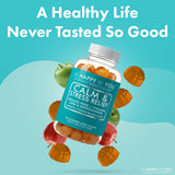 Be Happy Be You botella abierta con gominolas desplegadas invitando al consumo