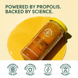 Beekeeper's Naturals frasco junto a regla para comparar tamaño práctico