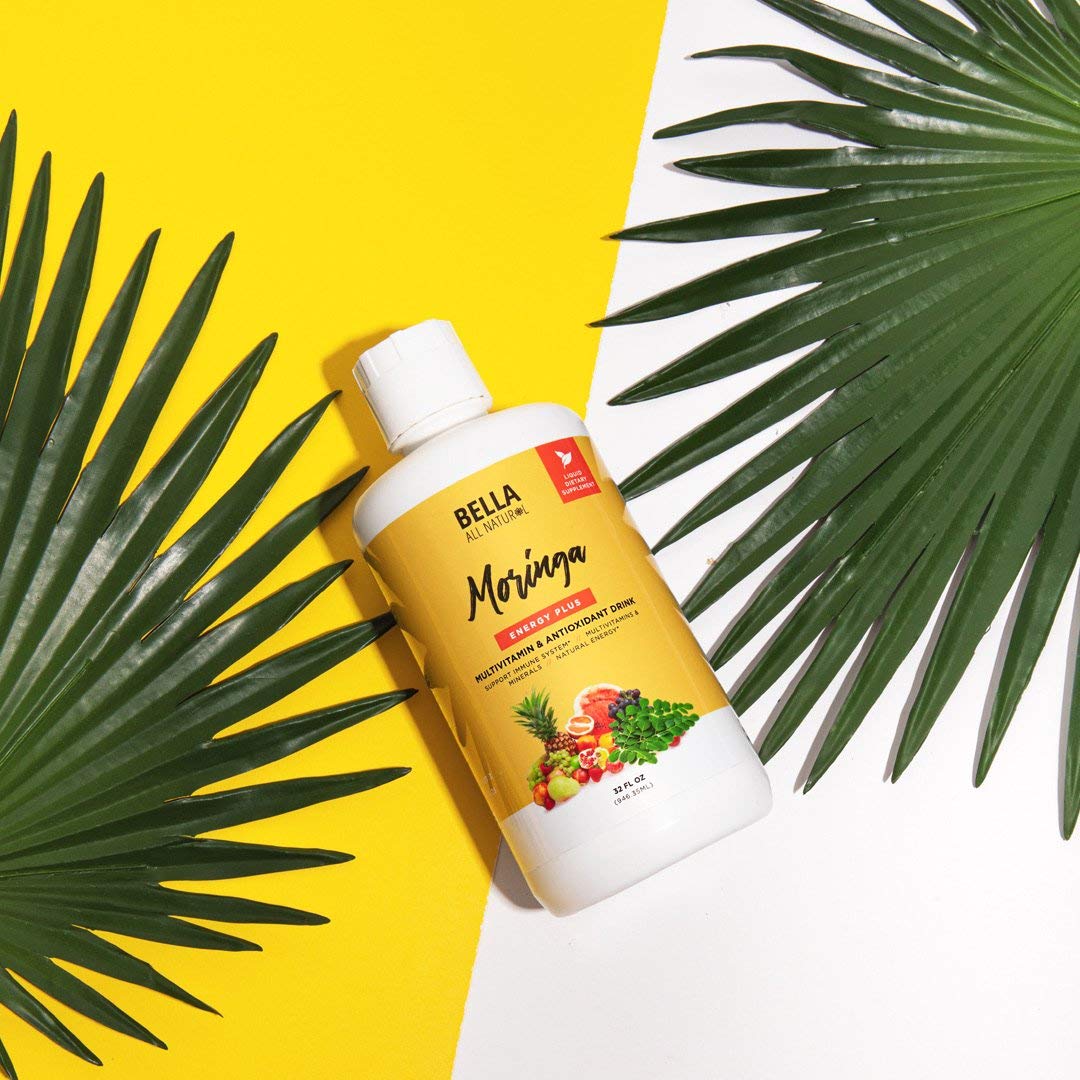 Bella All Natural envase 32oz junto a regla mostrando escala y tamaño real
