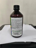 Best Naturals botella junto a una regla para comparar tamaño práctico