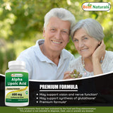 Best Naturals comparación de tamaño de la cápsula junto a una moneda