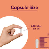 BESTVITE cápsula en mano para mostrar tamaño y facilidad de toma