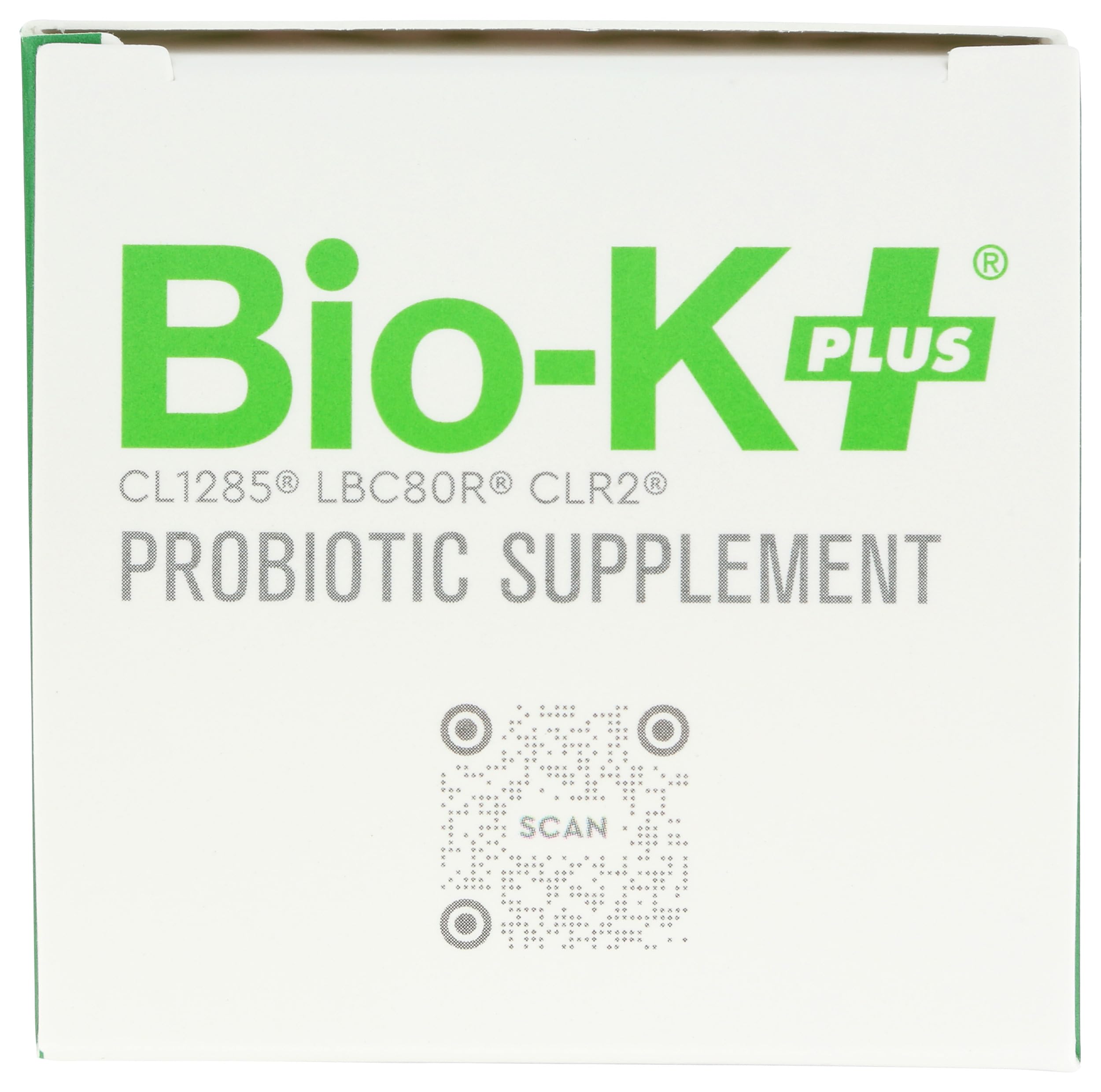 Bio-K Plus cápsulas alineadas en mano para visualizar tamaño y dosificación