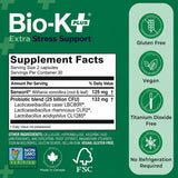 Bio-K Plus comparación de tamaño junto a un monedero para referencia práctica