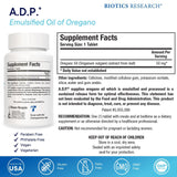 Biotics Research tableta A.D.P. en mano para apreciar tamaño
