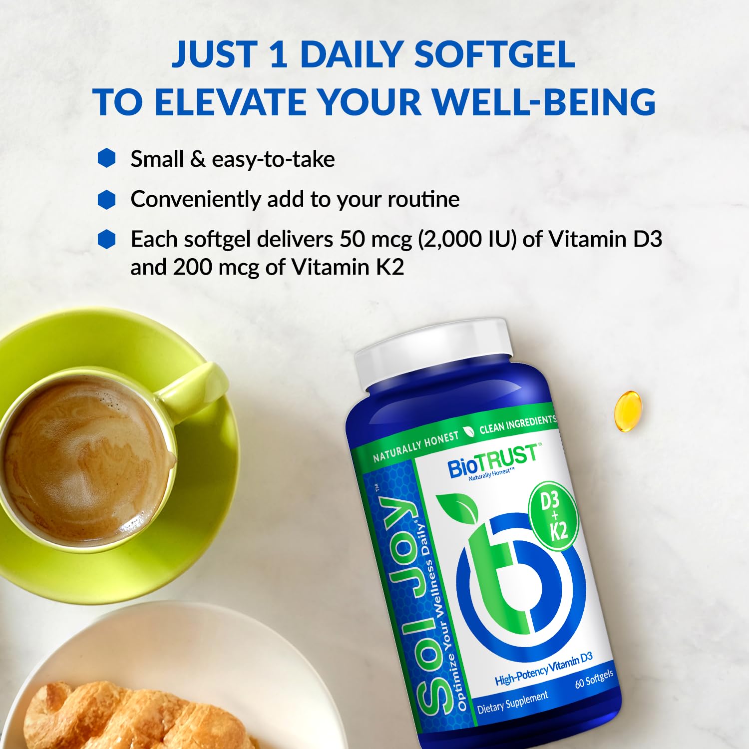 BioTrust Sol Joy softgel en mano para comparar tamaño y facilidad de uso
