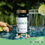 Bioxtron caja abierta con cápsulas organizadas dentro del envase