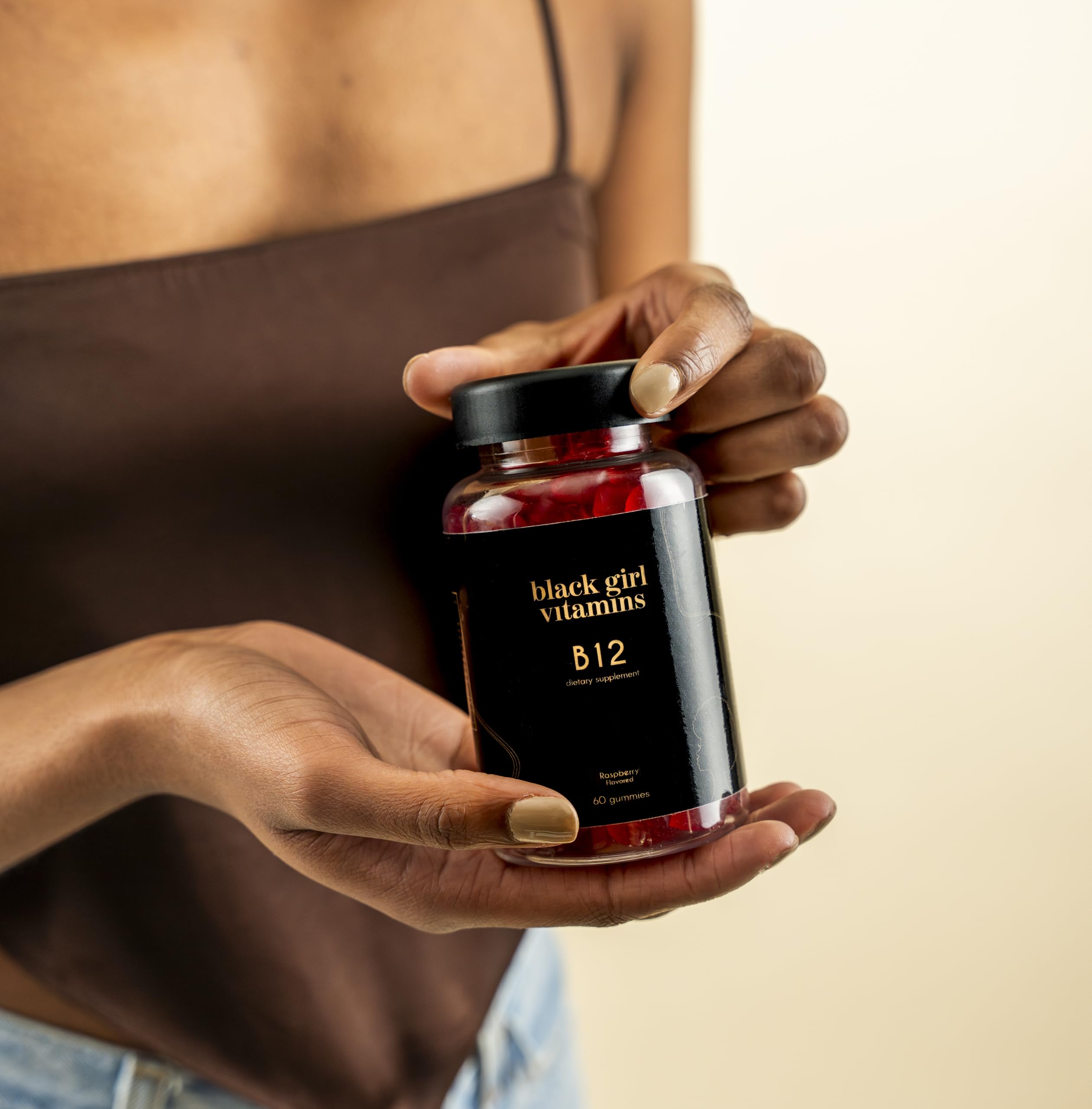 Black Girl Vitamins gomitas frambuesa presentadas como suplemento sabroso