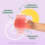 Bloom Nutrition vaso con bebida preparada, impulso pre entreno
