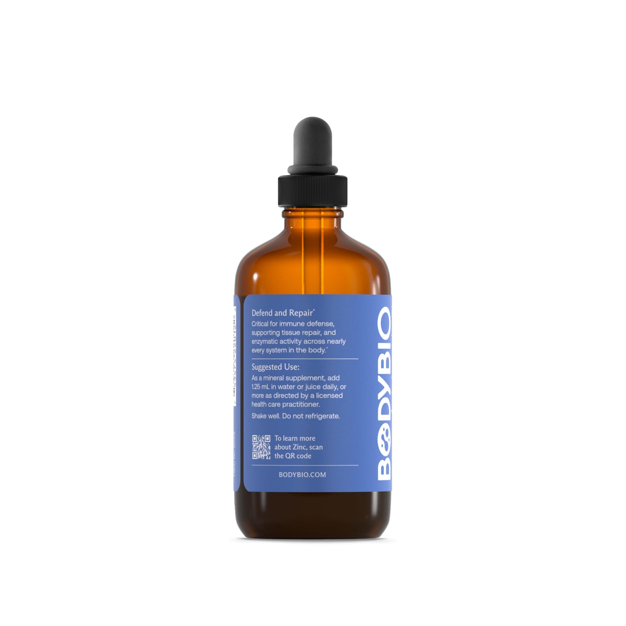 BodyBio Liquid Zinc gota en cuchara que muestra textura líquida y mezcla rápida
