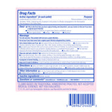 Close-up de pellets Boiron Candida 30C en cuchara, textura y pureza